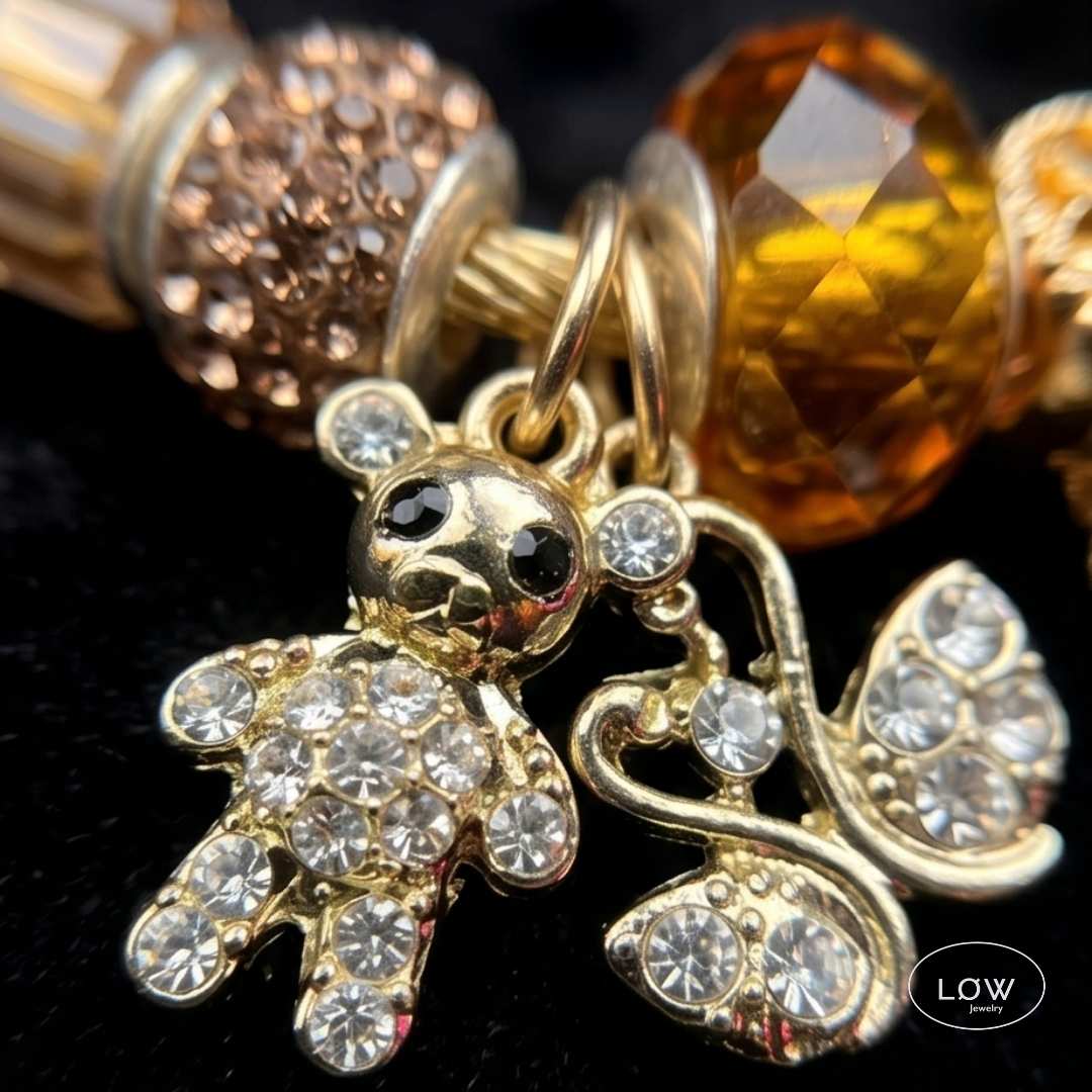 Charms armbånd Amber Swan Charm Bracelet Gold charmsarmbånd ferdig fylt med charm LØW Jewery