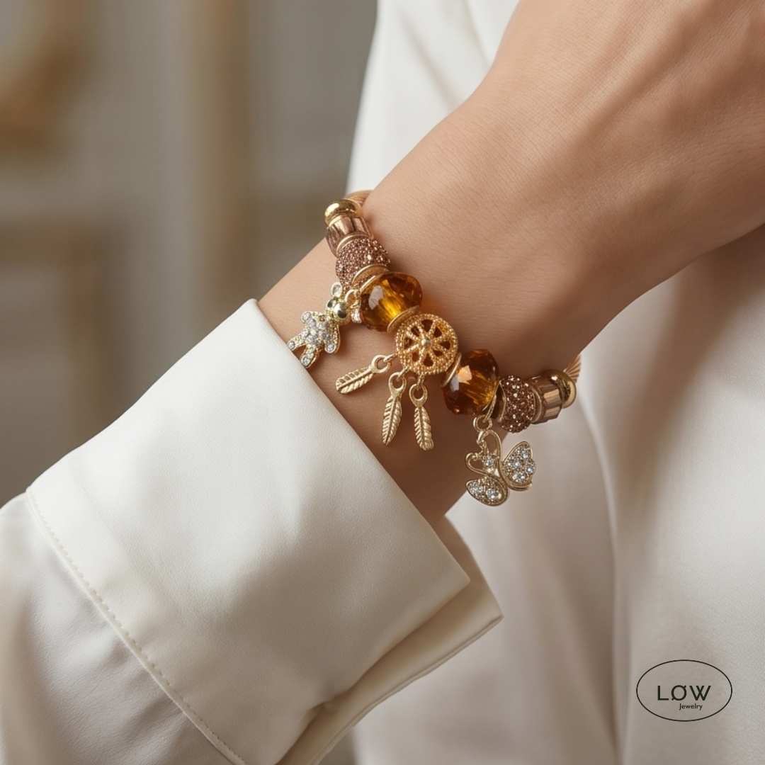 Charms armbånd Amber Swan Charm Bracelet Gold charmsarmbånd ferdig fylt med charm LØW Jewery