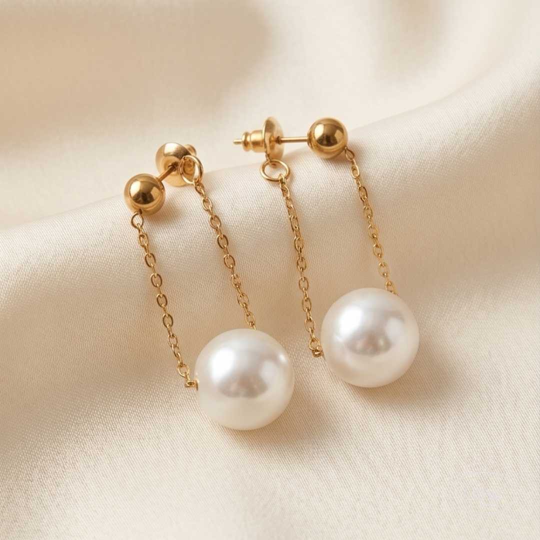 Celeste Floating Pearl Earrings Gold fra LØW Jewelry