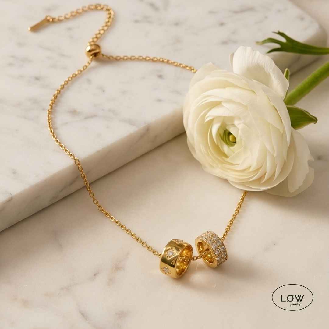 Eternal Duo Zircona Gold fra LØW Jewelry rustfritt stål belagt med 18K gull