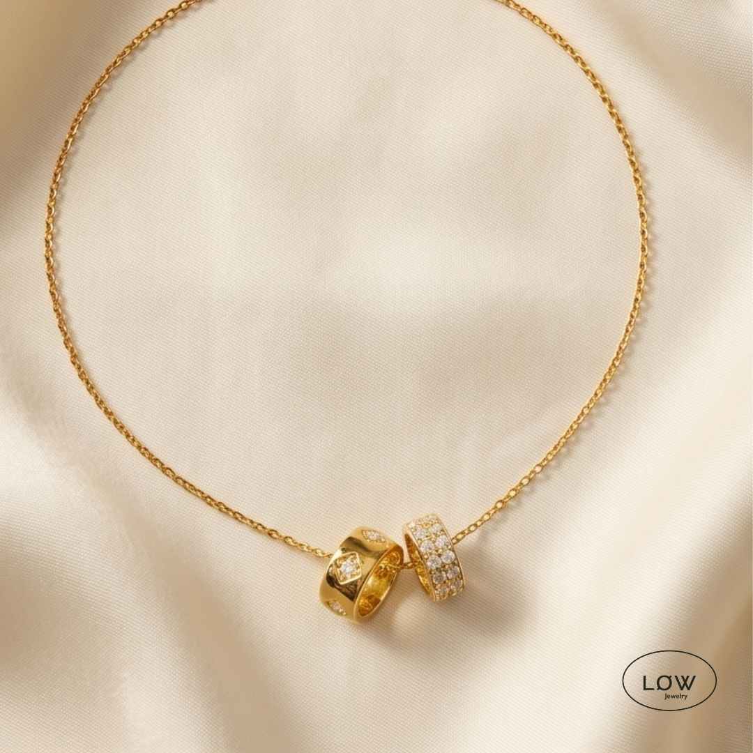 Eternal Duo Zircona Gold fra LØW Jewelry rustfritt stål belagt med 18K gull