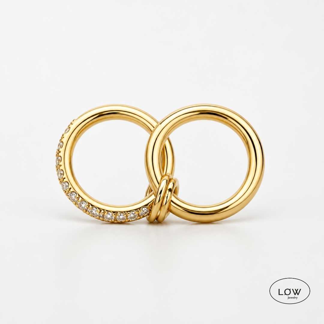 Linké Ring fra LØW Jewelry sammenlinket to ringer stainless steel zircona allianse