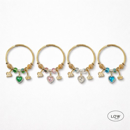 Royal Heart Charm Bracelet Gold fra LØW Jewelry ferdig fylt charms arbånd